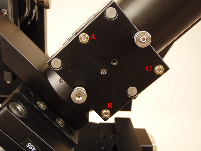 Use adjuster A alone, or B and C in tandem, to tilt beam in/out of focus plane. Use adjusters B or C alone, or in opposition, to tip beam horizontally to align parallel with the edge of the camera image.